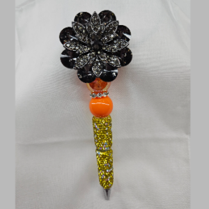 Black flower and orange crystal pen