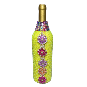 Yellow decorative wine bottle in a high heel
