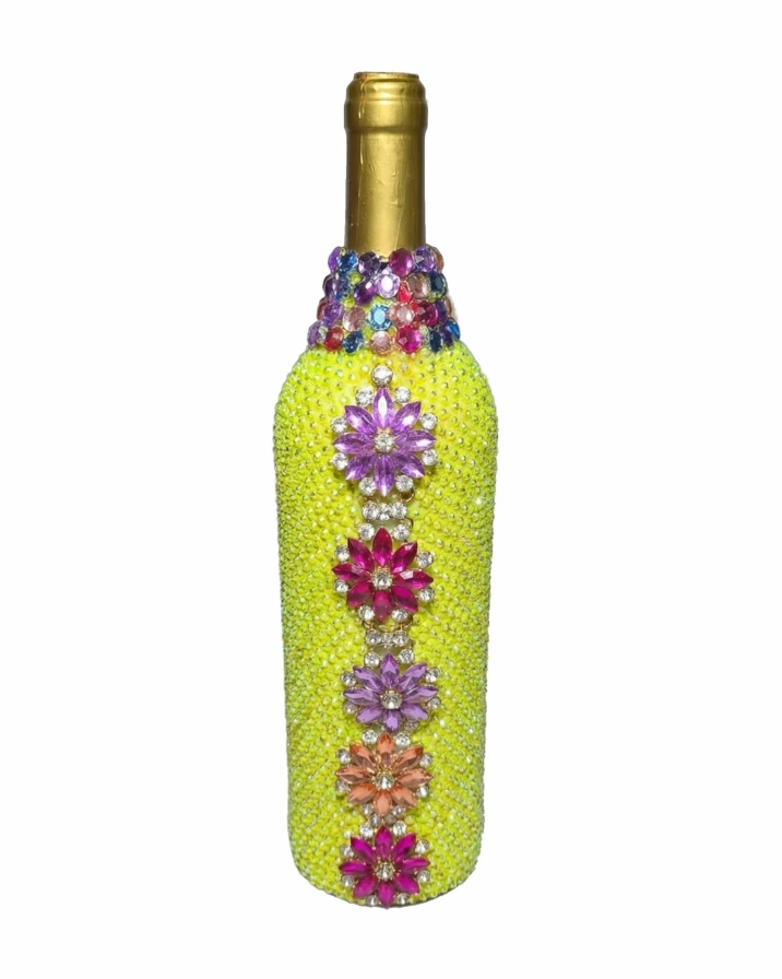 Yellow decorative wine bottle in a high heel